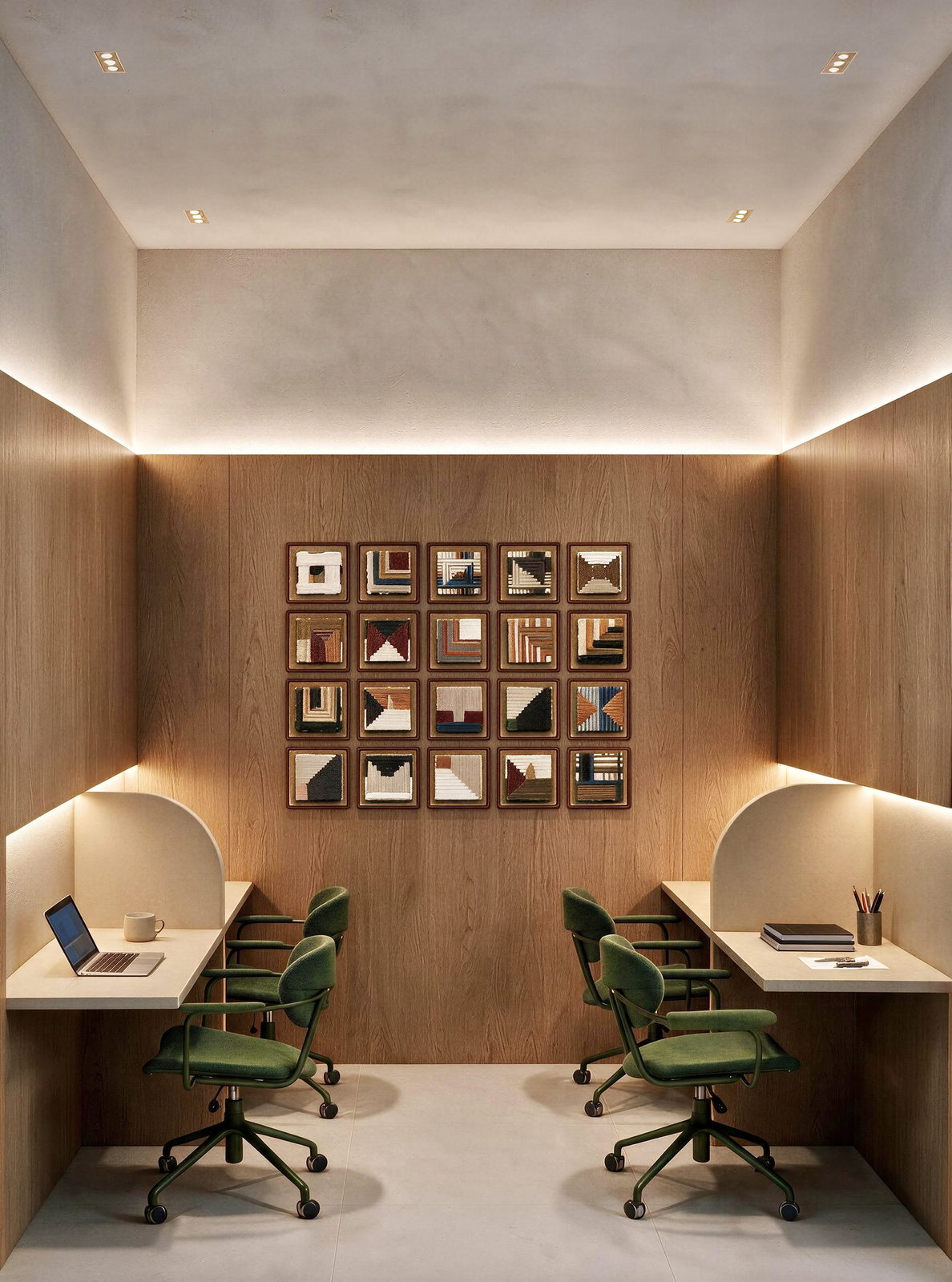 Coworking do Sansa Living com estações de trabalho em madeira